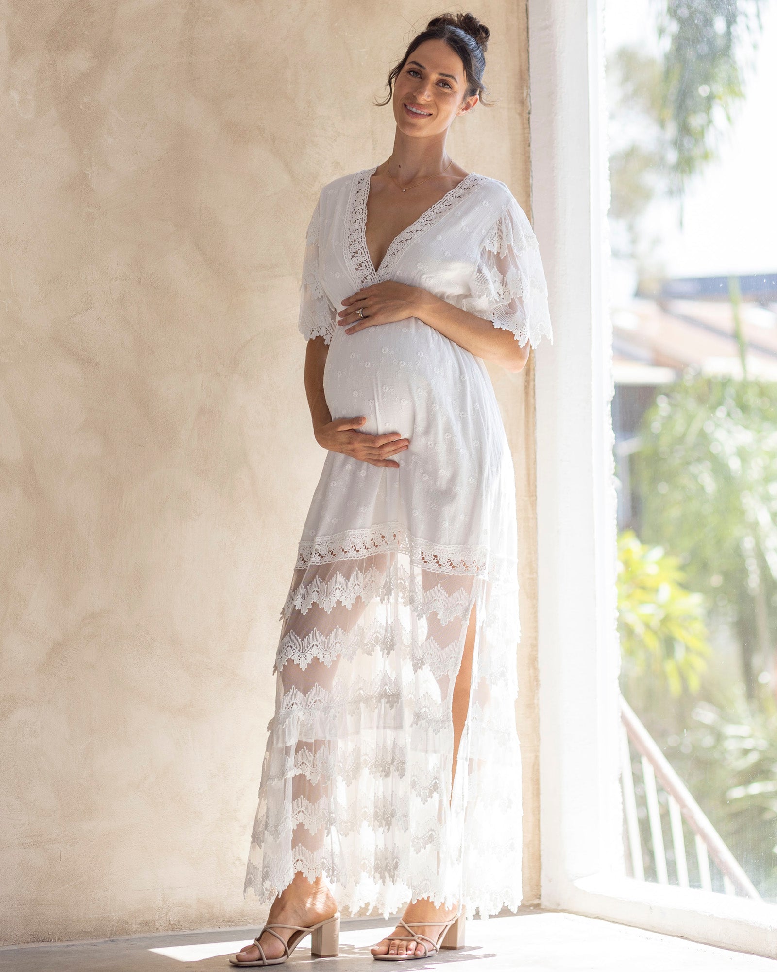 Flowing White Lace Maternity Maxi Dress for Special Occasions Flowing White Lace Maternity Maxi Dress for Special Occasions — Maternity Dresses 2027