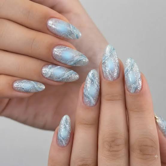 Ethereal Light Blue Marble with Silver Glitter Ethereal Light Blue Marble with Silver Glitter — Light Blue Quinceanera Nails 2027