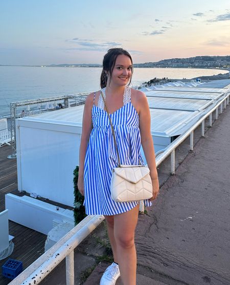 Striped Mini Dress and White Sneakers for Beachside Days Striped Mini Dress and White Sneakers for Beachside Days — Travel Outfits Europe 2027