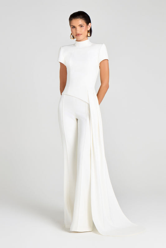 Modern Bridal Elegance: White Jumpsuit with Draped Overlay Modern Bridal Elegance: White Jumpsuit with Draped Overlay — Bride Bachelorette Outfits 2027