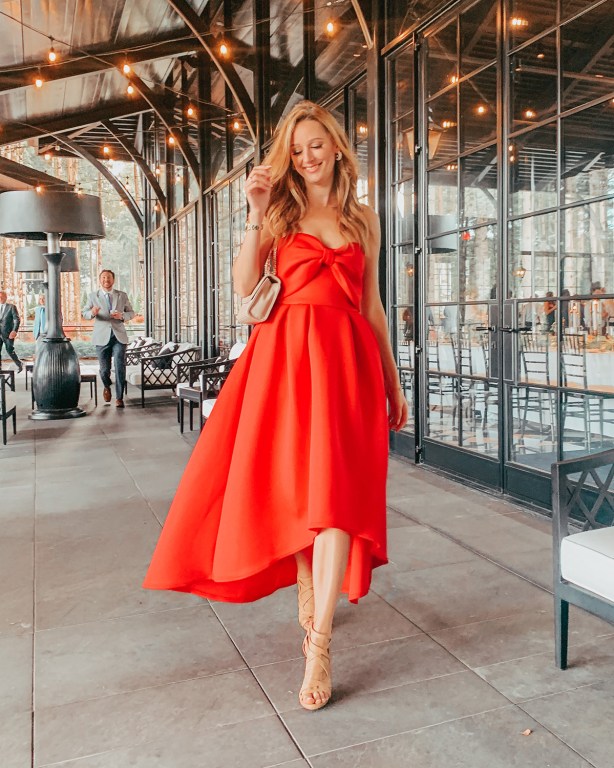 Vibrant Red Sleeveless Dress with High-Low Hem — Summer Wedding Outfits 2027