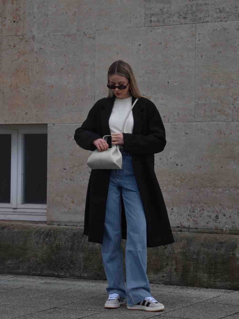 Classic Black Coat with Light Blue Jeans and White Top Classic Black Coat with Light Blue Jeans and White Top — Winter Blue Outfits 2027