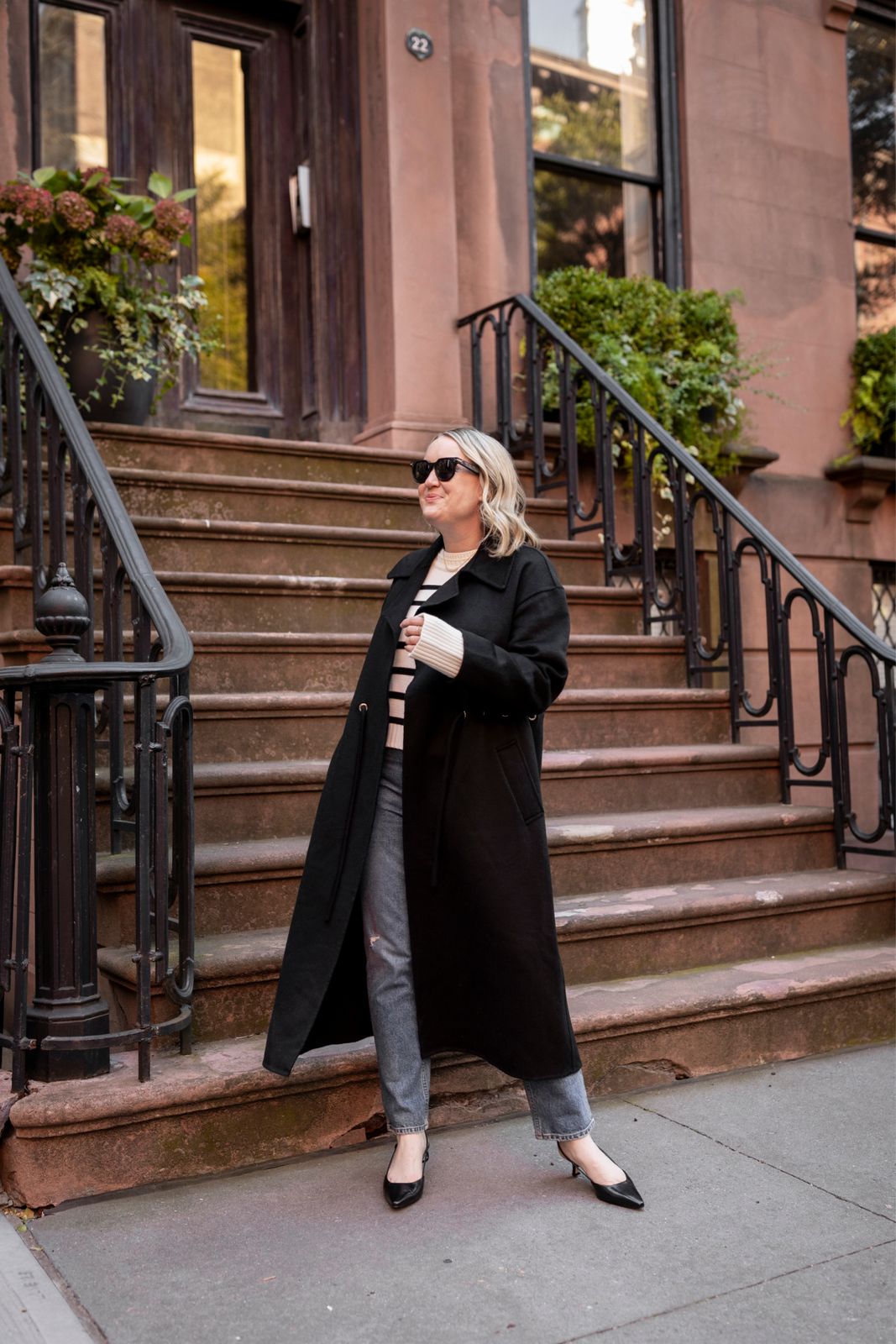 Striped Sweater Under a Black Coat with Pointed Heels Striped Sweater Under a Black Coat with Pointed Heels — Winter Outfits Warm Climate 2027