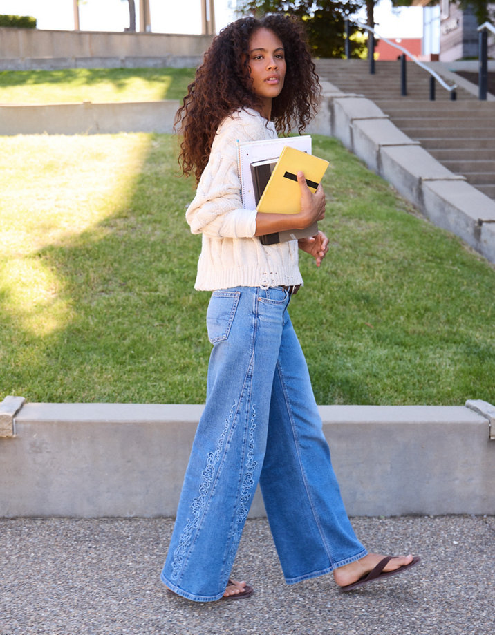 Boho Chic: Light Wash Low-Rise Jeans with Cable Knit Boho Chic: Light Wash Low-Rise Jeans with Cable Knit — Low Rise Jeans 2027