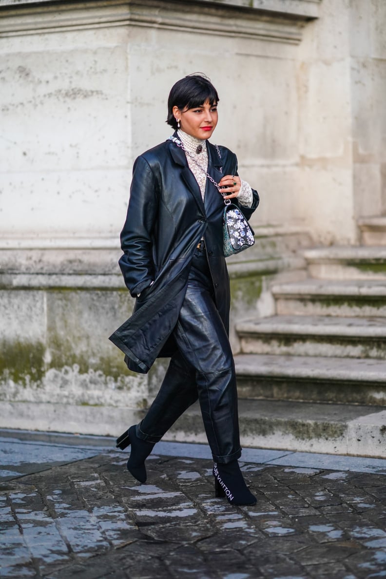 Modern Monochrome: Black Leather Pants with Patterned Top and Coat Modern Monochrome: Black Leather Pants with Patterned Top and Coat — Leather Pants Outfits 2027