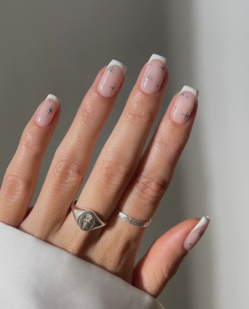 Sheer Pink White French Star Accents Sheer Pink White French Star Accents — Neutral Christmas Nails 2026