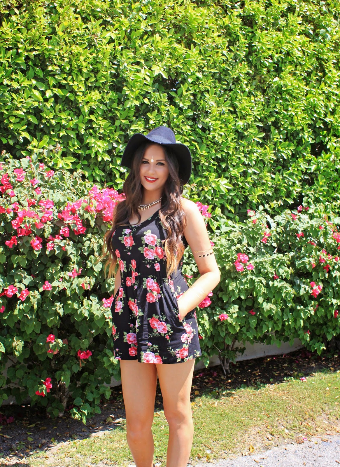 Black Floral Romper with Wide-Brimmed Hat Black Floral Romper with Wide-Brimmed Hat — Coachella Outfits 2027