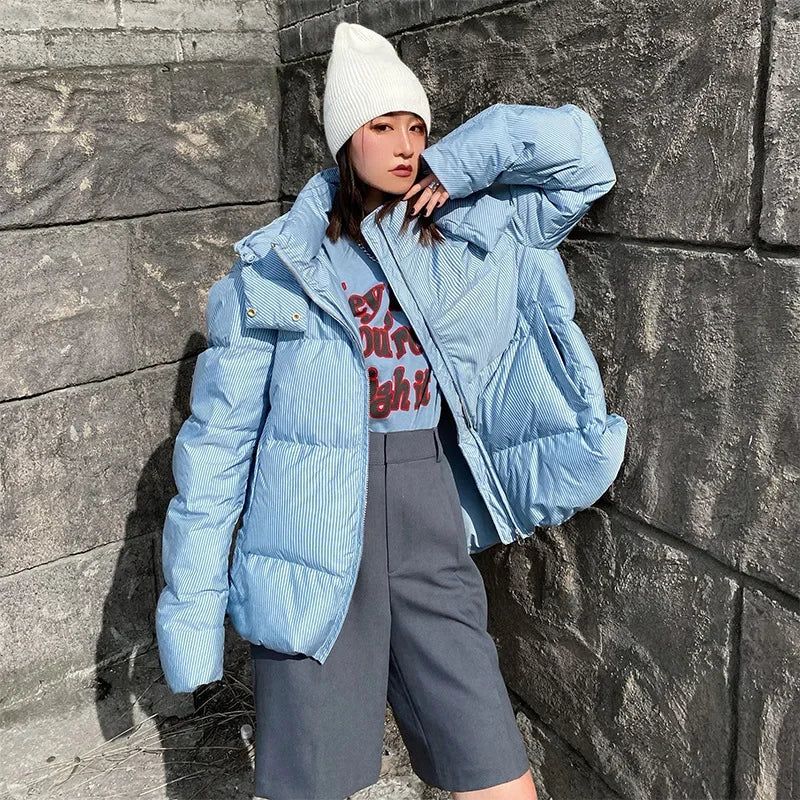 Light Blue Pinstripe Puffer with Relaxed Shorts — Winter Puffer Jacket Outfits 2027