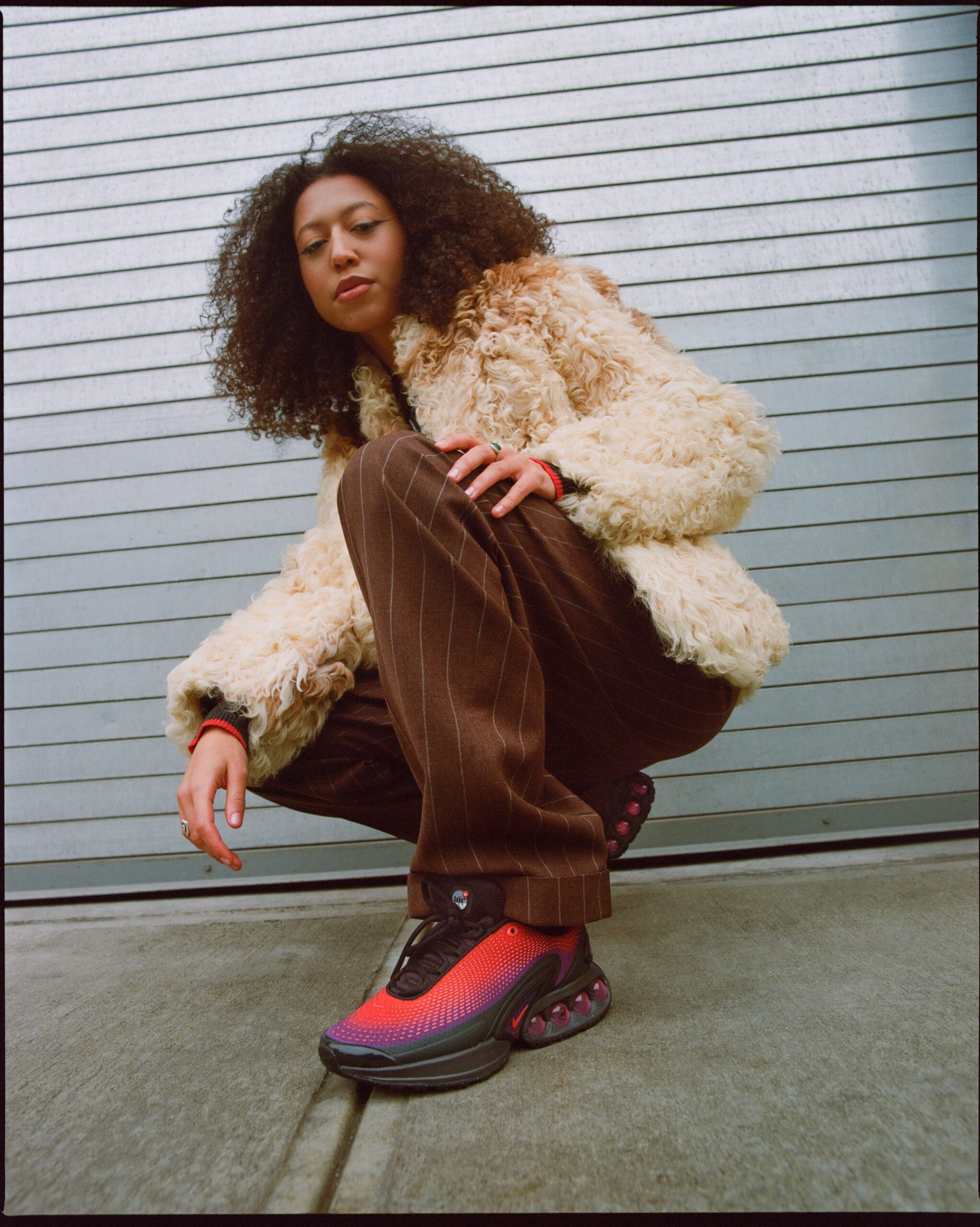 Pinstripe Trousers with Statement Sneakers Pinstripe Trousers with Statement Sneakers — Nike Outfits 2027