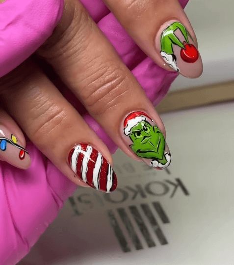 The Grinch and Candy Cane Oval Nails The Grinch and Candy Cane Oval Nails — Christmas Acrylic Nails 2026