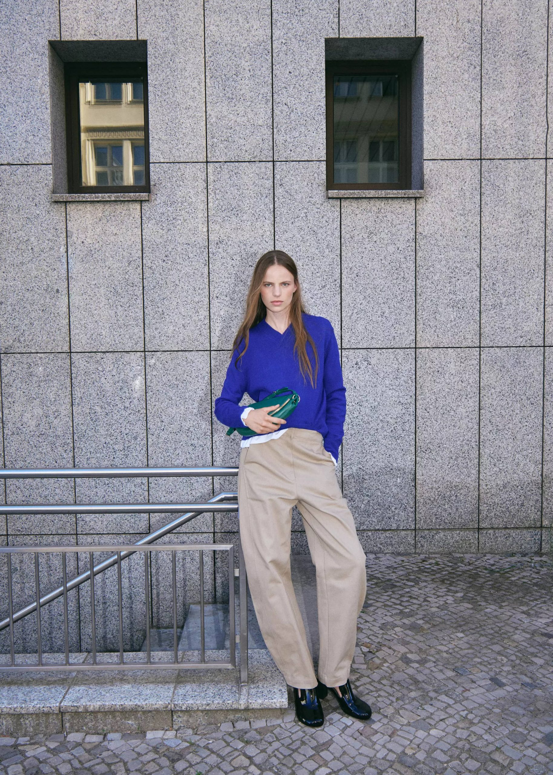 Vibrant Blue Sweater with Neutral Trousers for a Pop of Color — Minimalist Outfits 2027