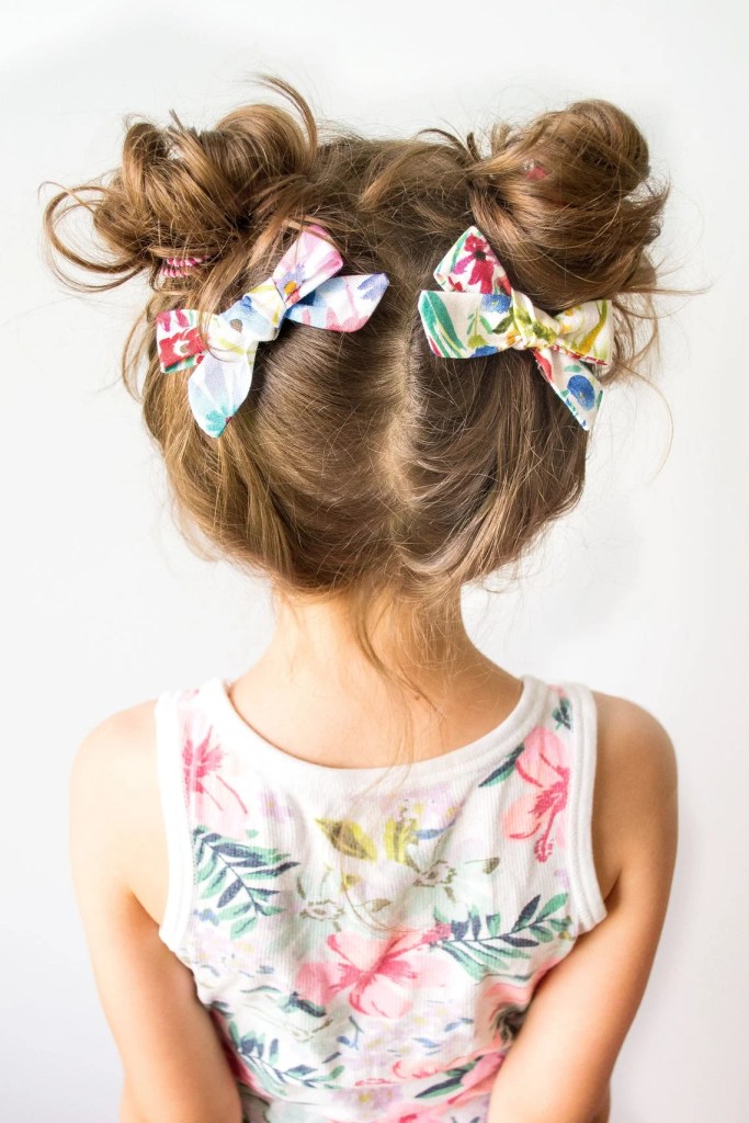 Brown Buns With Floral Bows Brown Buns With Floral Bows — Little Girl Hairstyles 2027