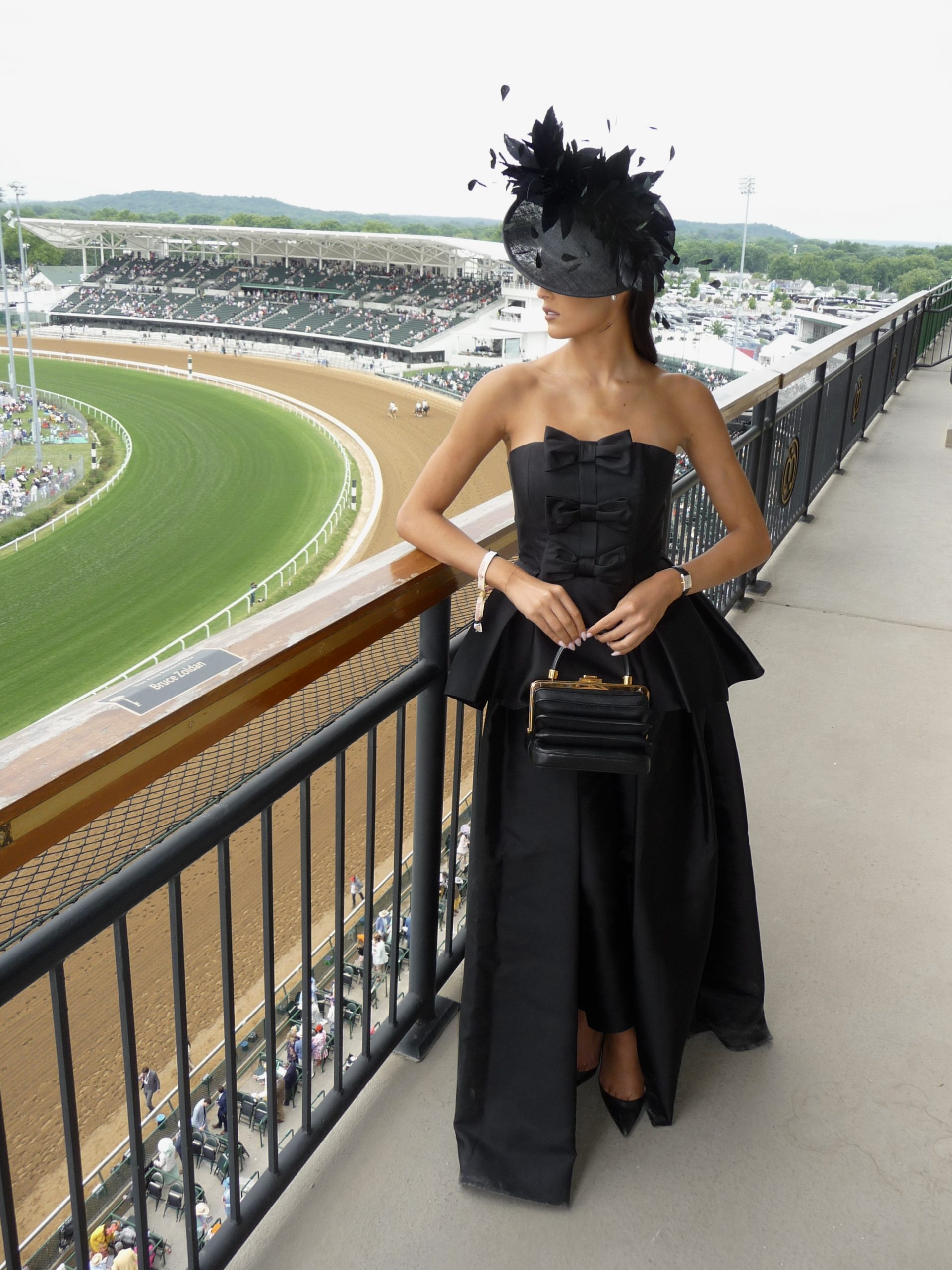 Black Strapless Gown with Feathered Fascinator — Kentucky Derby Outfits 2027