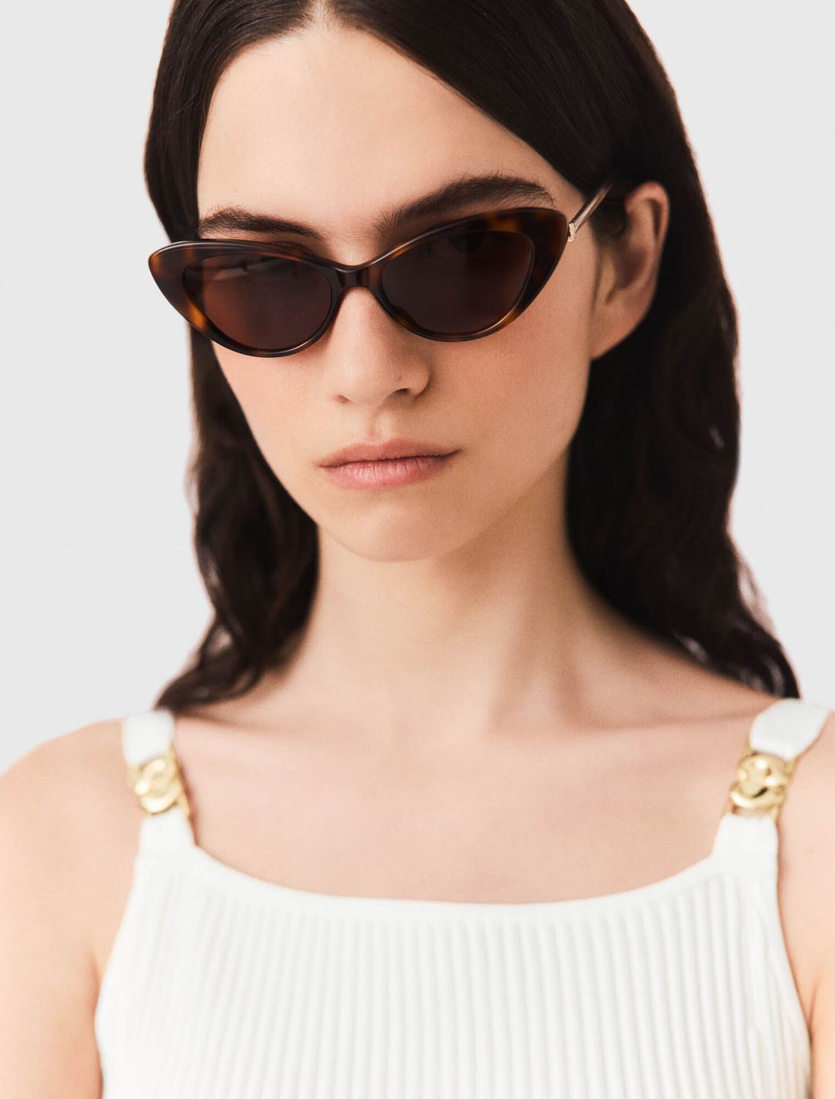 White Ribbed Top with Gold Hardware and Tortoiseshell Cat Eyes — Cat Eye Sunglasses Outfits 2027