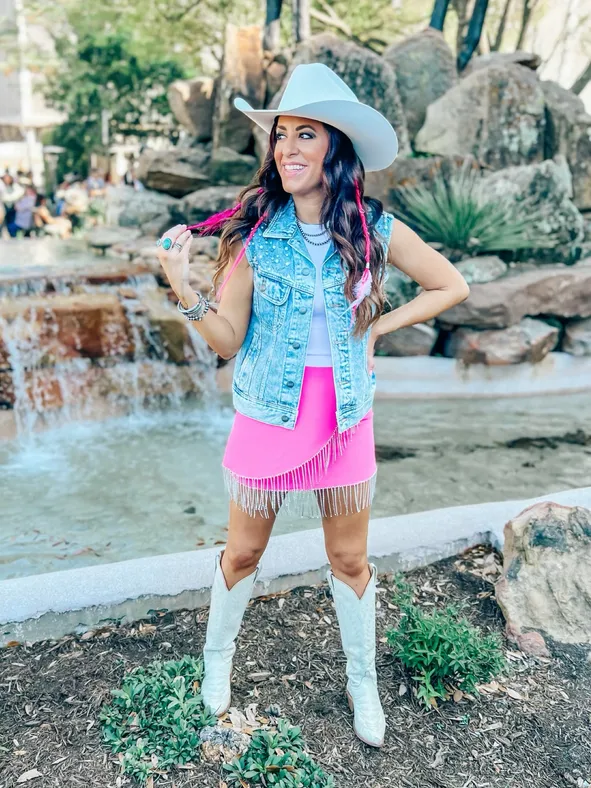 Denim Vest, Fringe Skirt, and White Cowboy Boots Denim Vest, Fringe Skirt, and White Cowboy Boots — Rodeo Outfits 2027