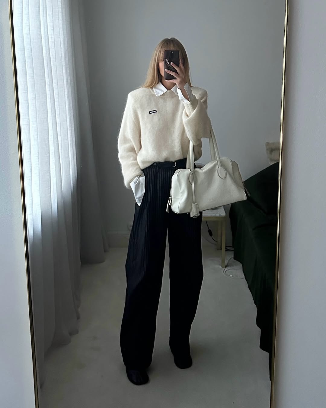 Cream Oversized Knit Over White Shirt and Corduroy Trousers Cream Oversized Knit Over White Shirt and Corduroy Trousers — Scandinavian Outfits 2027