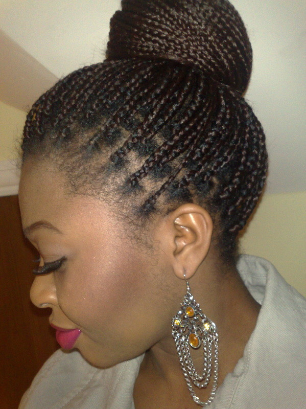 High Bun With Intricate Braids High Bun With Intricate Braids — Natural Hairstyles 2027 with Weave