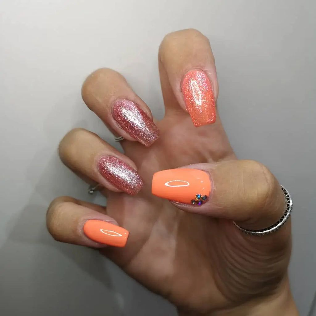 Visual Idea — The Nails Have A Glossy Finish — Coral Coffin Nails 2027