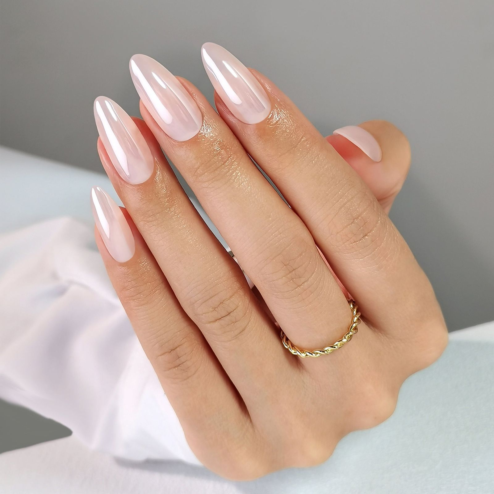 Pale Pink Pearlescent Stiletto Nails Pale Pink Pearlescent Stiletto Nails — Champagne Nails 2027