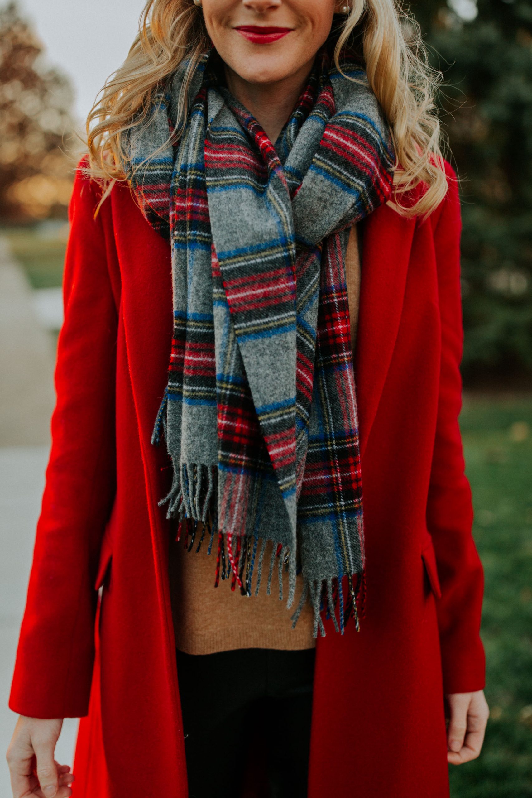 Vibrant Red Coat with a Grey Plaid Scarf — Plaid Christmas Outfits 2026