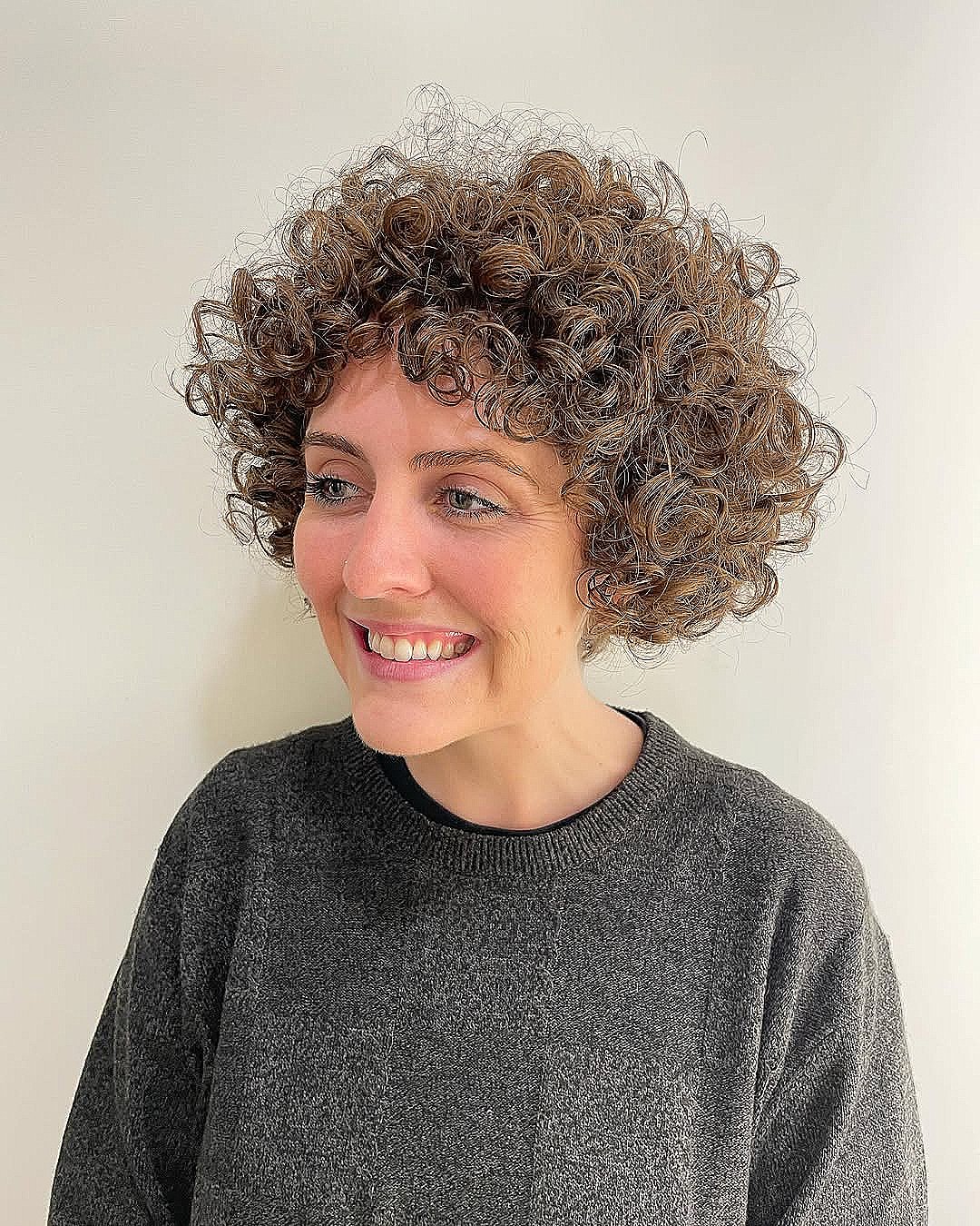 Thick Black Layered Curly Bob Thick Black Layered Curly Bob — Curly Haircuts 2027