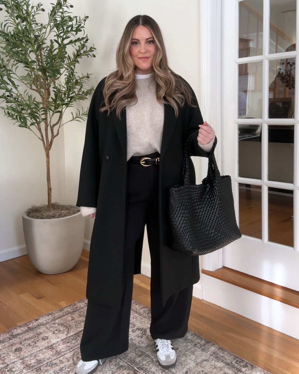 Monochromatic Ease: Black Coat, Beige Knit, and Wide-Leg Pants — Cold Weather Outfits 2027