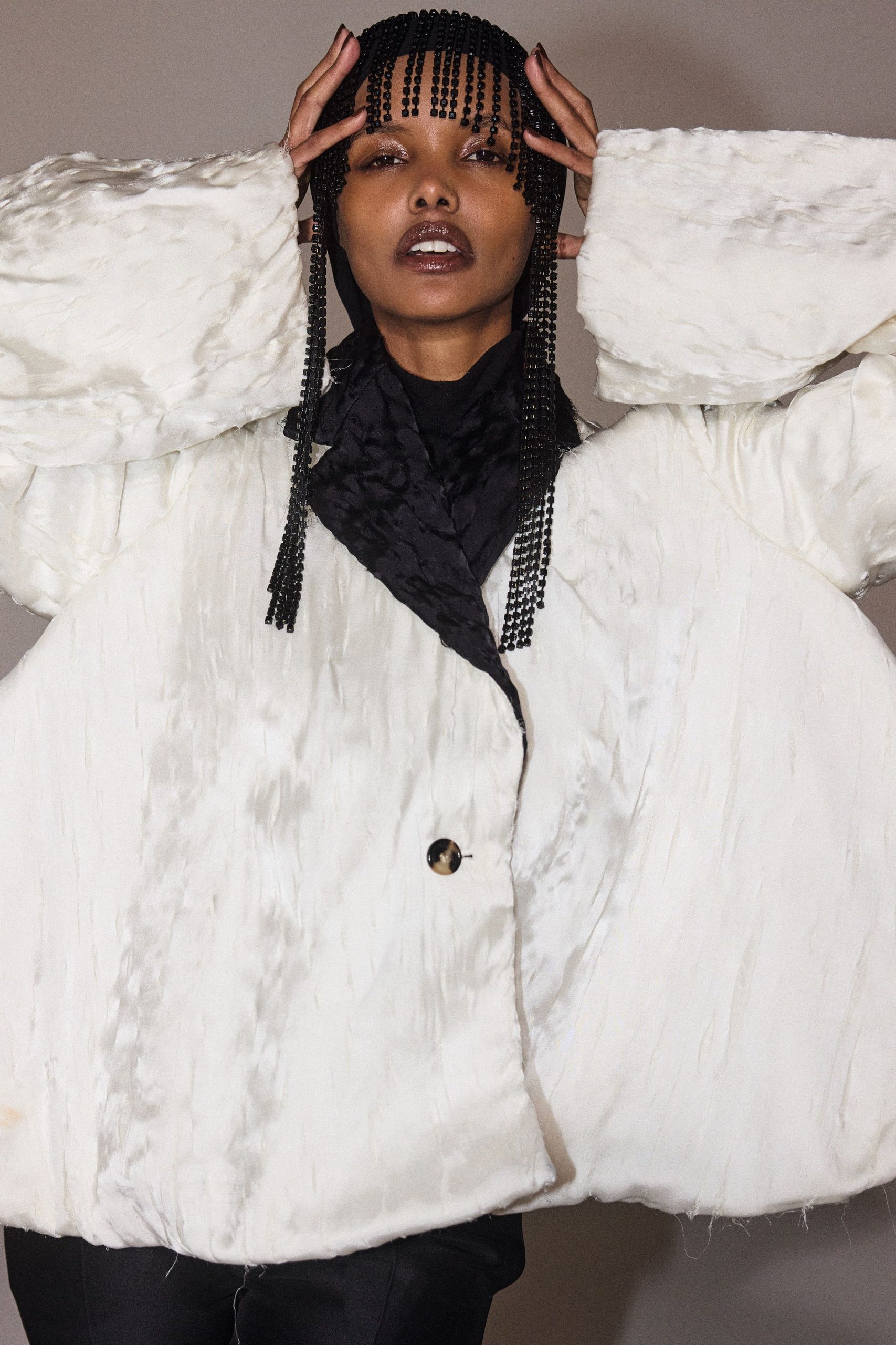 Oversized Volume and Texture: White Jacket with Black Turtleneck Oversized Volume and Texture: White Jacket with Black Turtleneck — Modest Outfits 2027