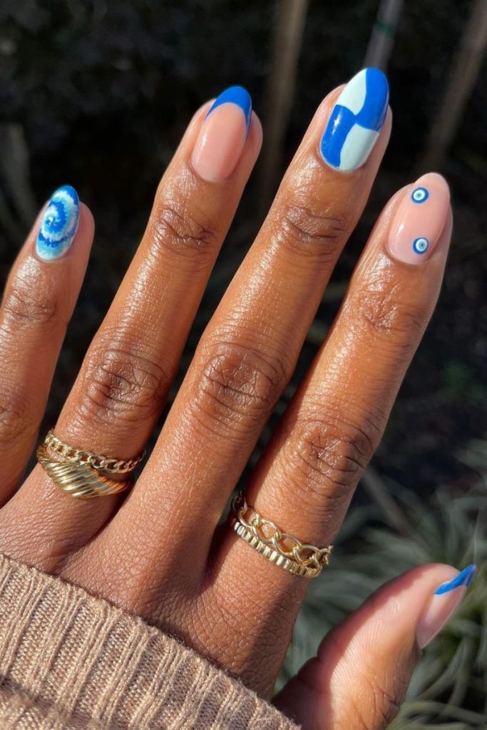 Light Blue French Tips with Evil Eye Light Blue French Tips with Evil Eye — Light Blue Quinceanera Nails 2027