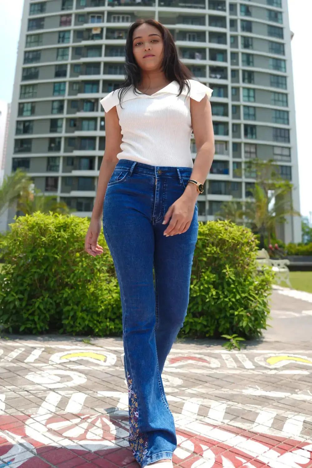 Embroidered Hem Blue Bootcut Jeans with White Knit Top Embroidered Hem Blue Bootcut Jeans with White Knit Top — Blue Bootcut Jeans Outfits 2027