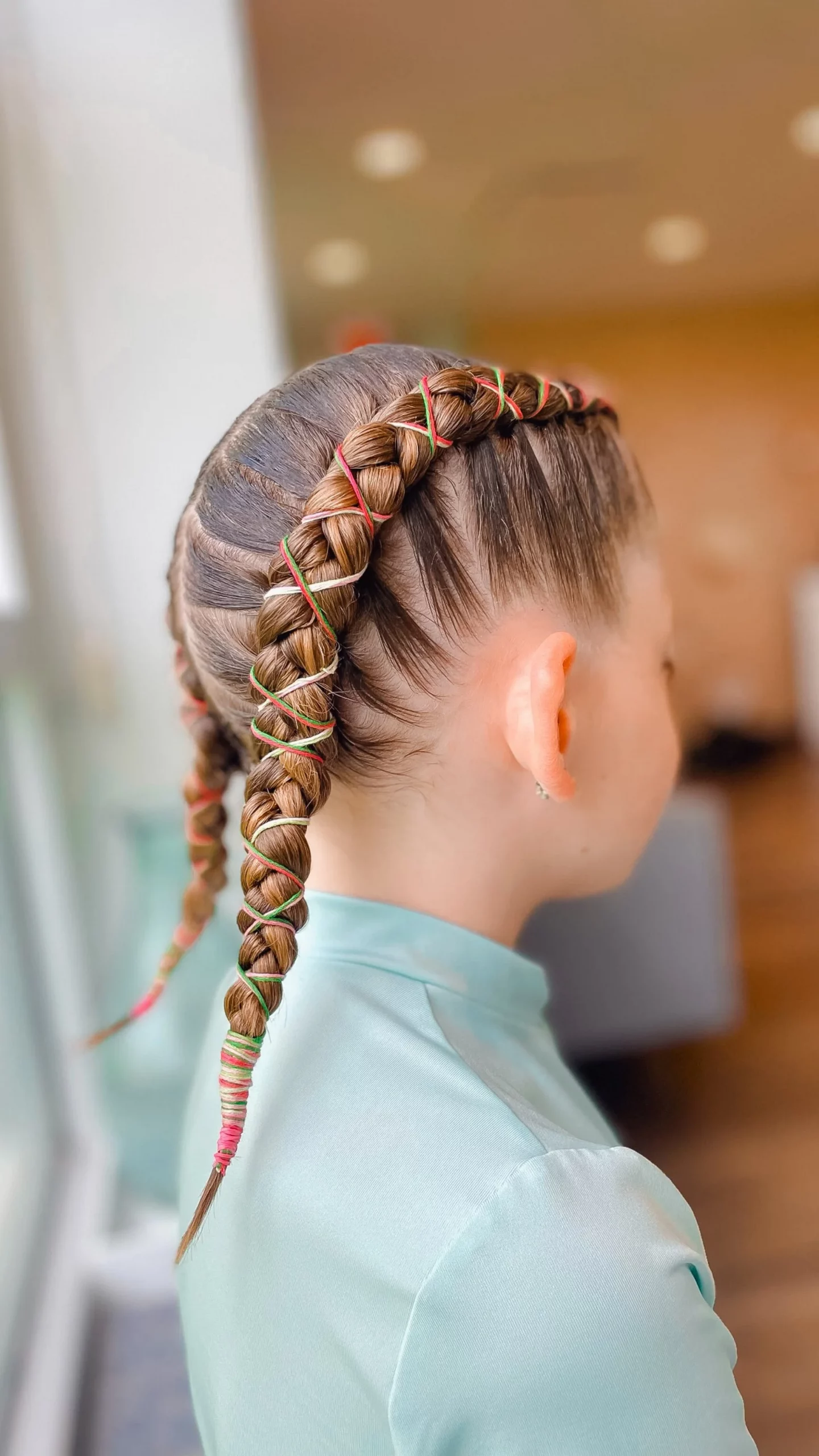 Red Braided Buns with Flowers Red Braided Buns with Flowers — Easter Hairstyles 2027