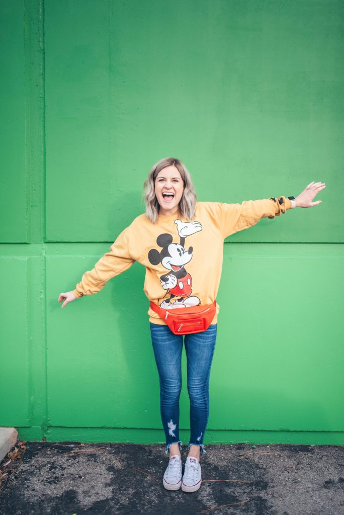 Yellow Mickey Mouse Sweatshirt with Fanny Pack — Disney Winter Outfits 2027