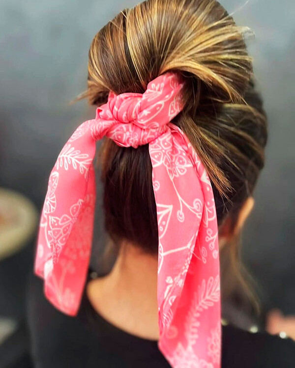 Mid-Back Messy Bun With Pink Scarf Mid-Back Messy Bun With Pink Scarf — Scarf Hairstyles 2027