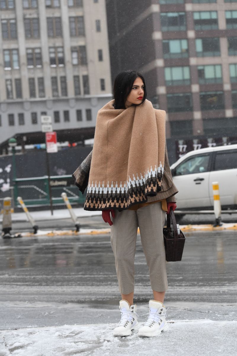 Patterned Poncho Layered Over Checked Trousers Patterned Poncho Layered Over Checked Trousers — Winter Photoshoot Outfits 2027