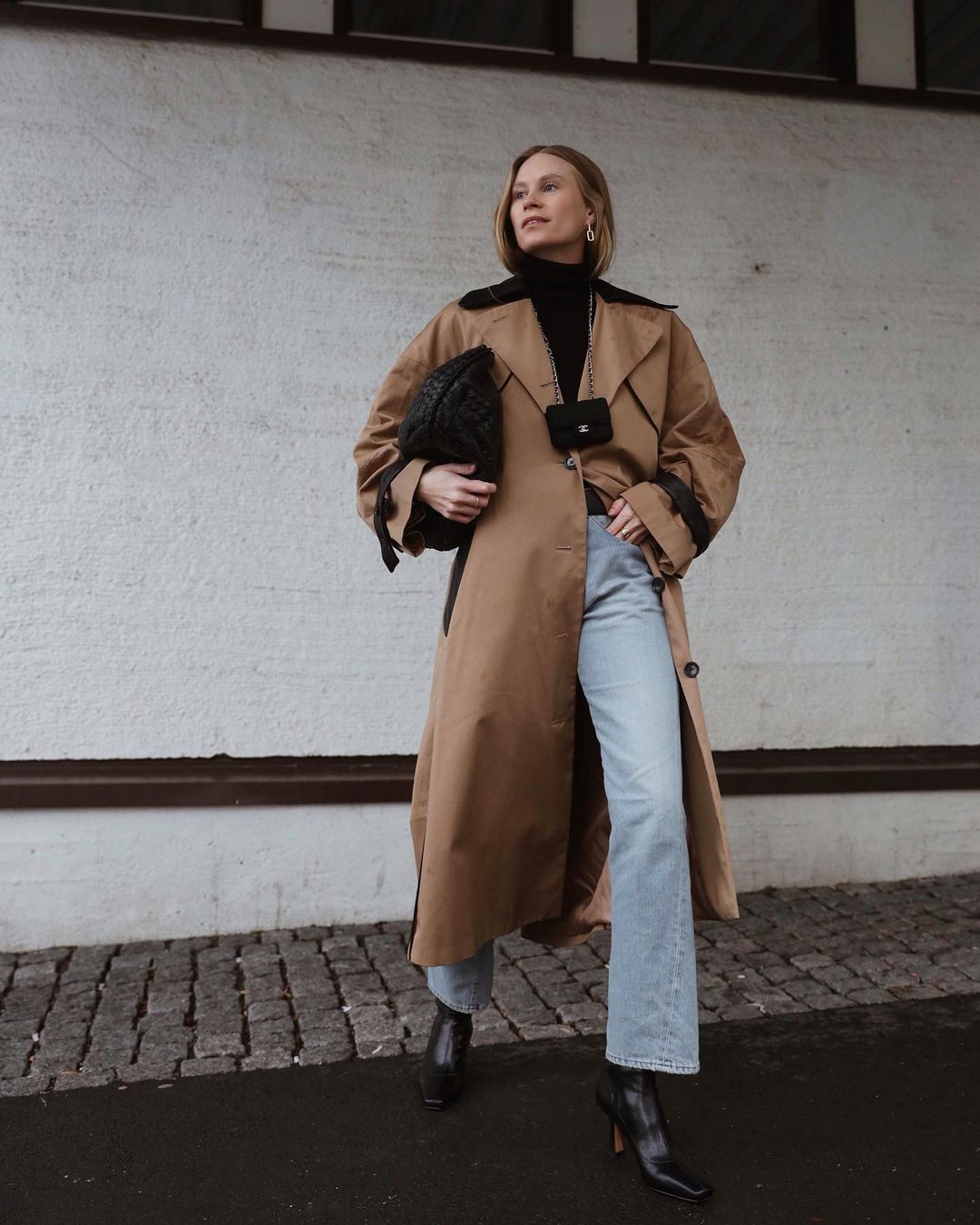 Tan Trench Coat with Turtleneck and Woven Clutch — Spring Outfits 2027 with Trench Coat