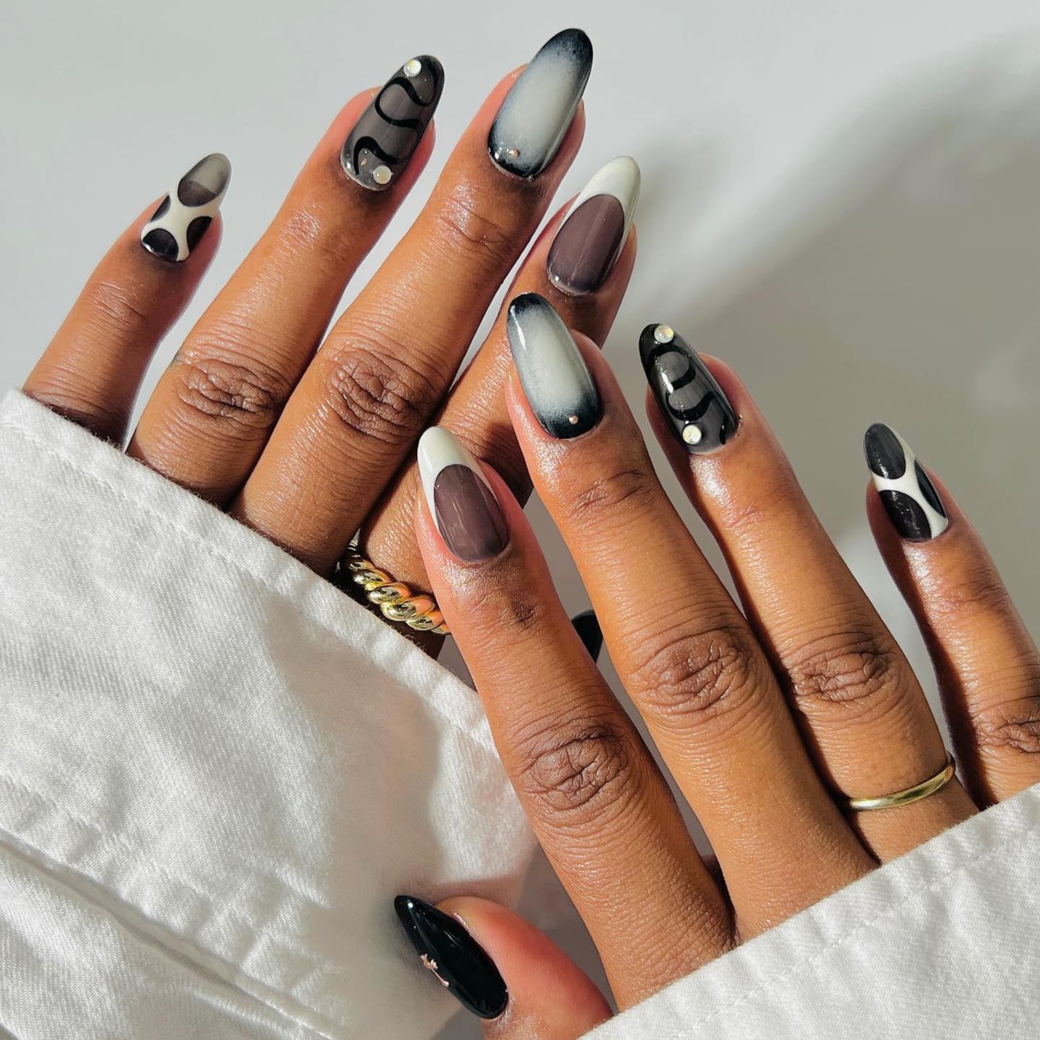 Abstract Swirls Cow Print Almond French Tips Abstract Swirls Cow Print Almond French Tips — Baddie Nails 2027