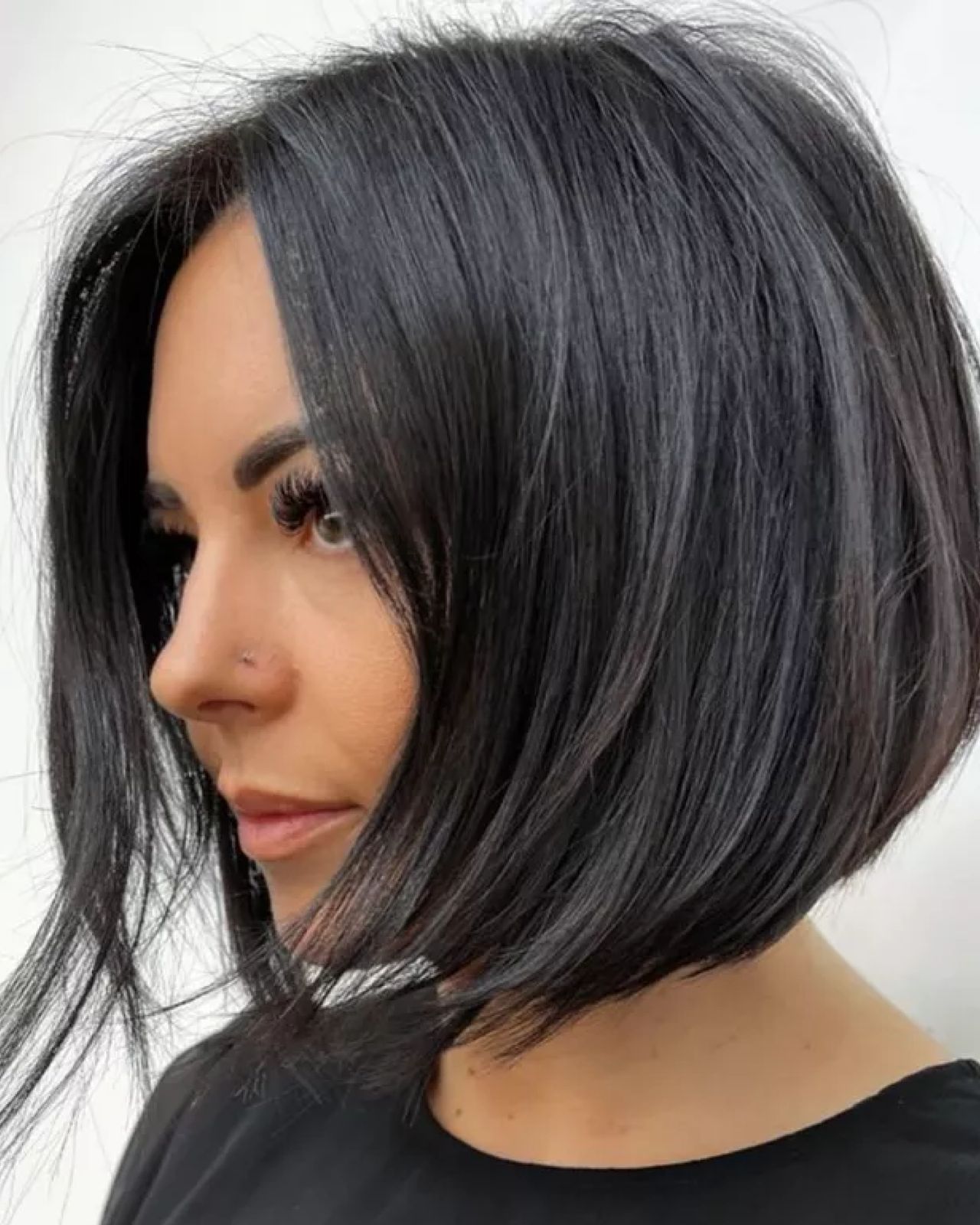 Dark Brown Angled Bob with Side Bangs — Low Maintenance Haircuts 2027