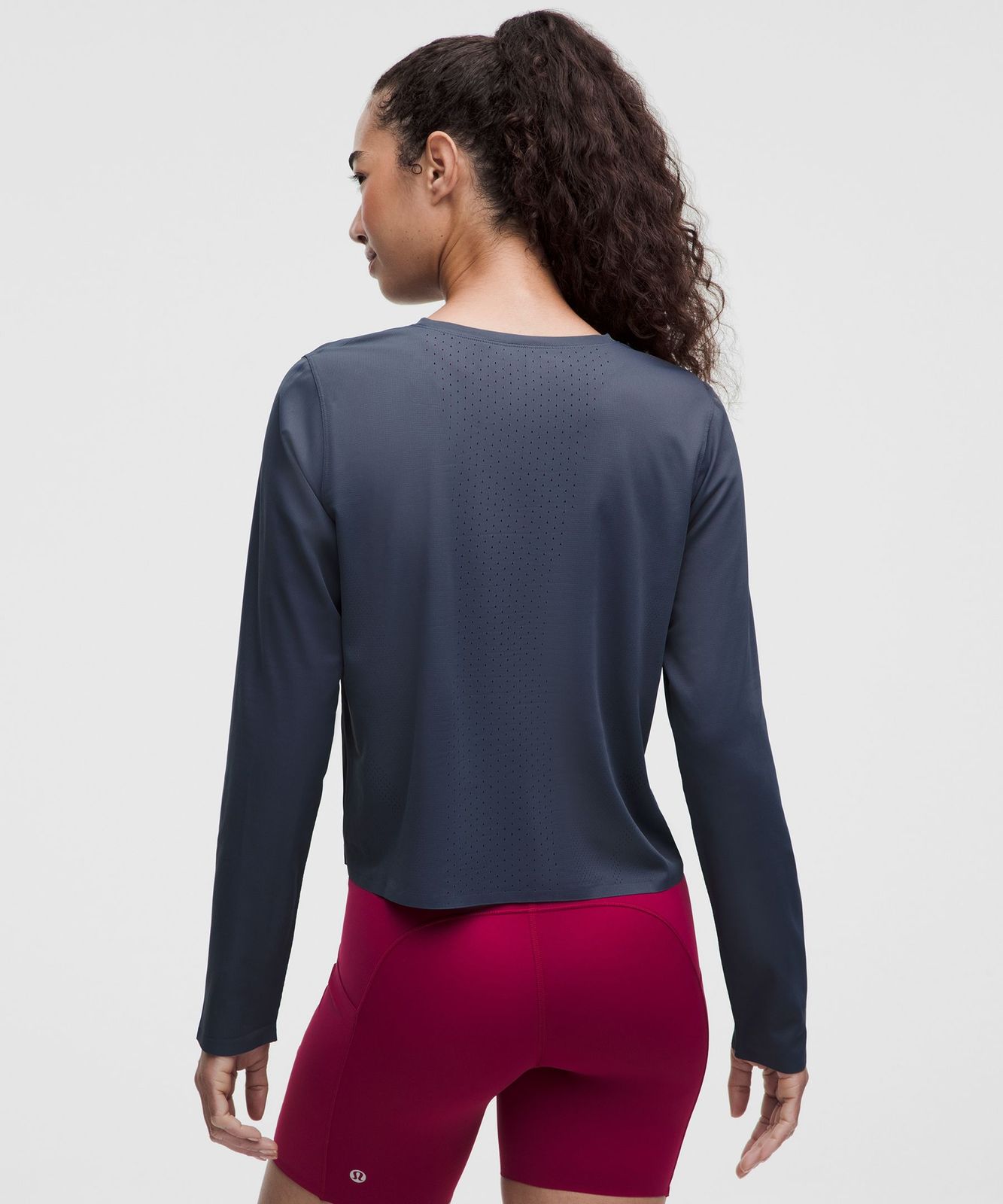 Dark Grey Top with Maroon Shorts and Perforated Details — Athletic Hiking Outfits 2027