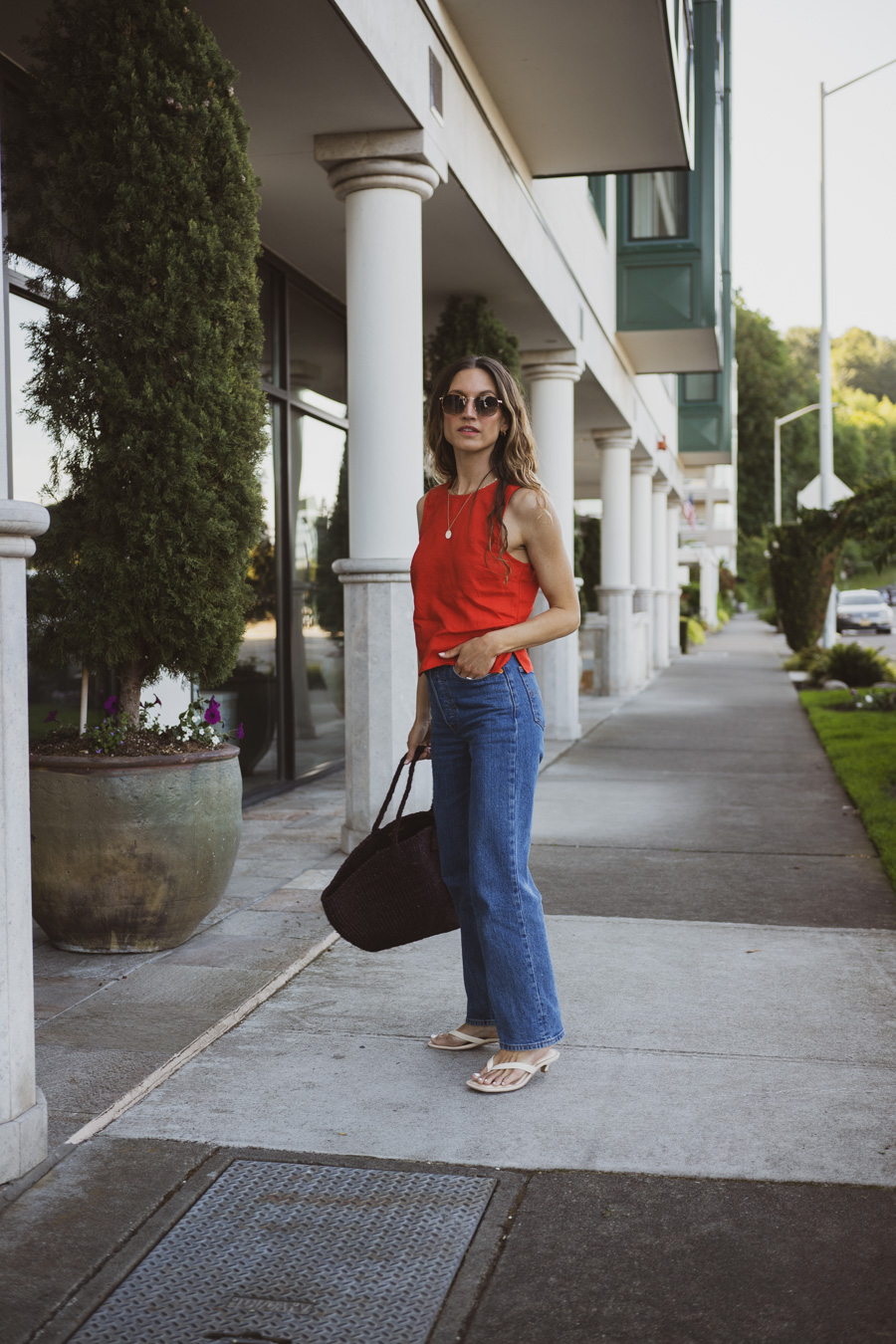 Bold Red Tank with Wide-Leg Jeans and Woven Tote — Tank Top Outfits 2027