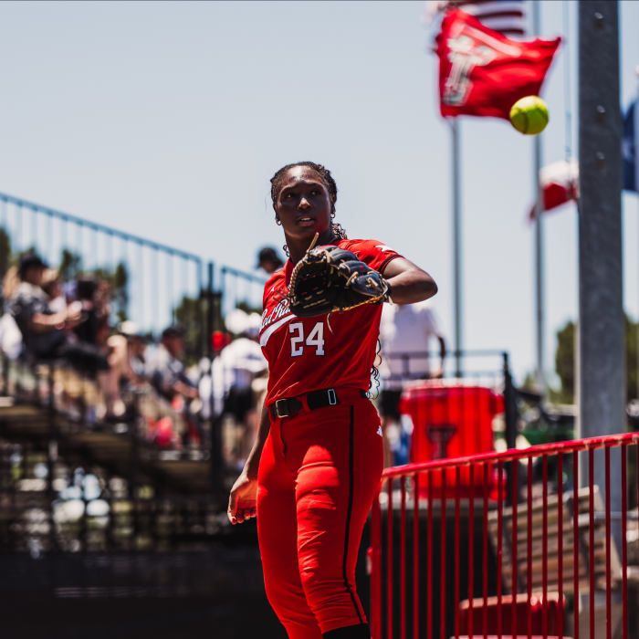 Red Softball Uniform with Black Cleats Red Softball Uniform with Black Cleats — Softball Outfits for Women 2027