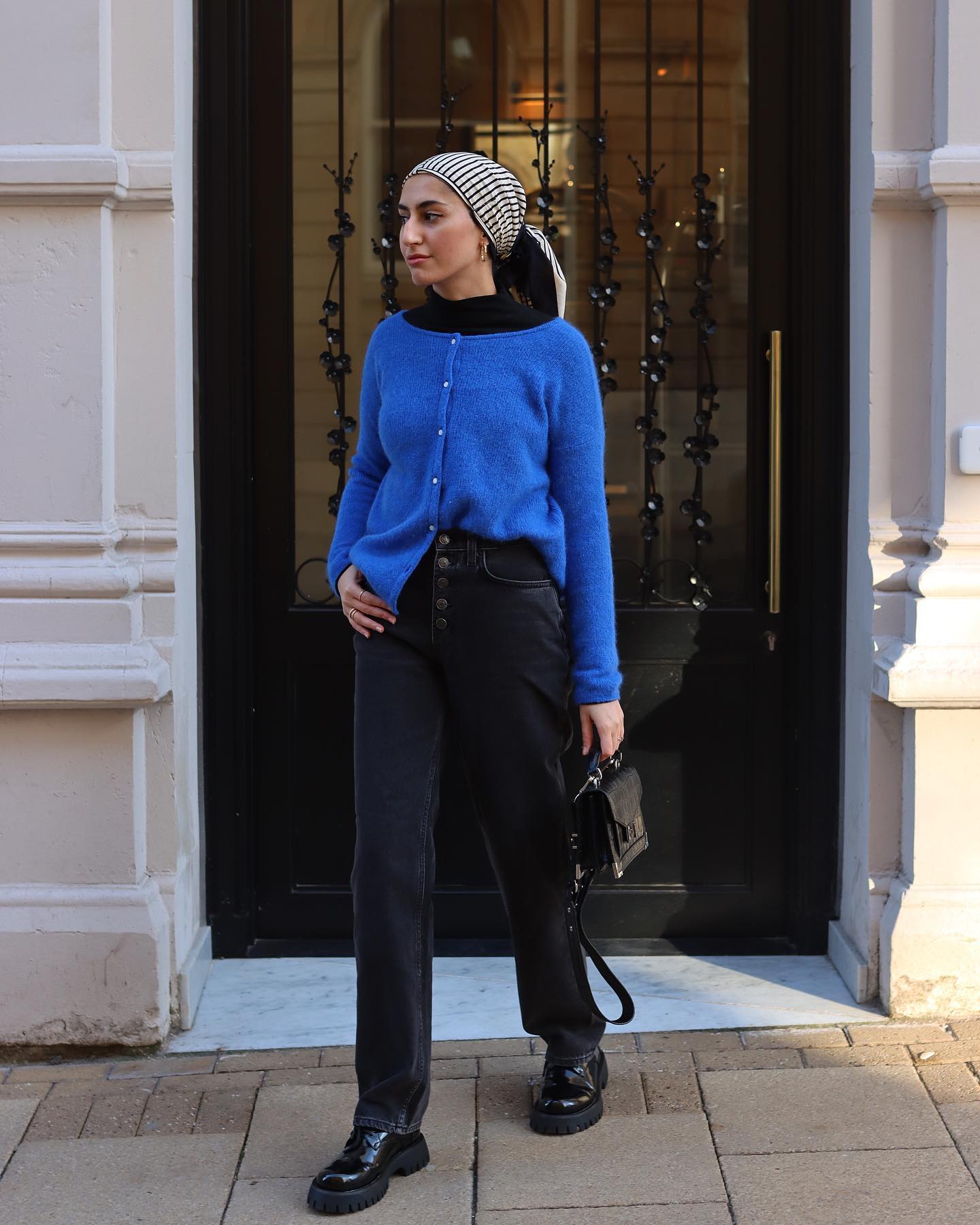Chic Layering: Knit Vest Over Turtleneck with Wide-Leg Jeans Chic Layering: Knit Vest Over Turtleneck with Wide-Leg Jeans — Black Jeans Outfits 2027