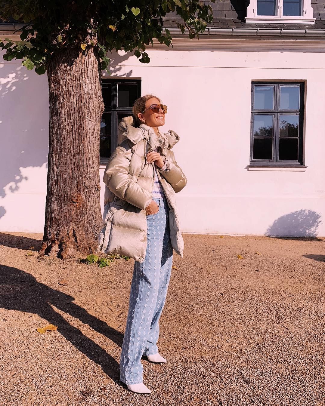 Beige Puffer with Striped Top and White Boots — Winter Puffer Jacket Outfits 2027