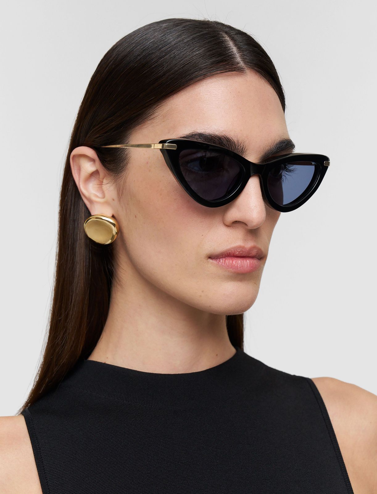 Black Fitted Top, Cat Eyes, and Bold Gold Earrings — Cat Eye Sunglasses Outfits 2027