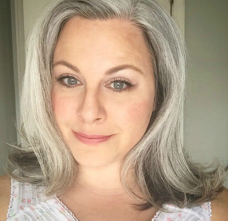 Collarbone Lob With Curtain Bangs — Transitioning to Gray Hair 2027