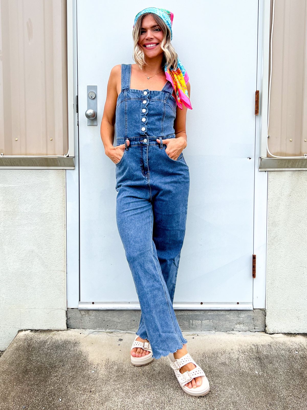 Blue Denim Jumpsuit with Flared Legs and a Colorful Headscarf Blue Denim Jumpsuit with Flared Legs and a Colorful Headscarf — Overalls 2027