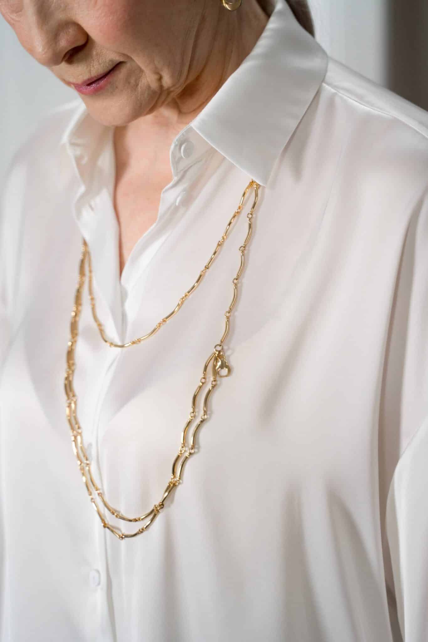 Silk Shirt and Gold Necklace: Elegant Detail Close-Up — Outfits 2027 for Women Over 60