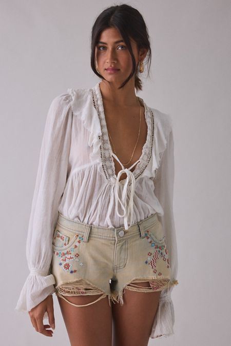 Embroidered Denim Shorts with a Ruffled Blouse for a Spring Break Charm Embroidered Denim Shorts with a Ruffled Blouse for a Spring Break Charm — Spring Break Outfits 2027