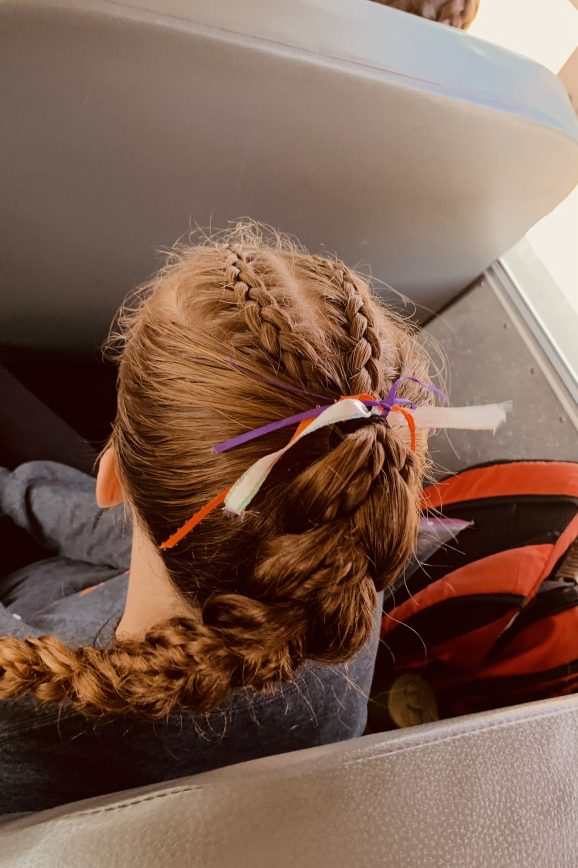 Braids into Bun with Colorful Ribbons Braids into Bun with Colorful Ribbons — Game Day Hairstyles 2026