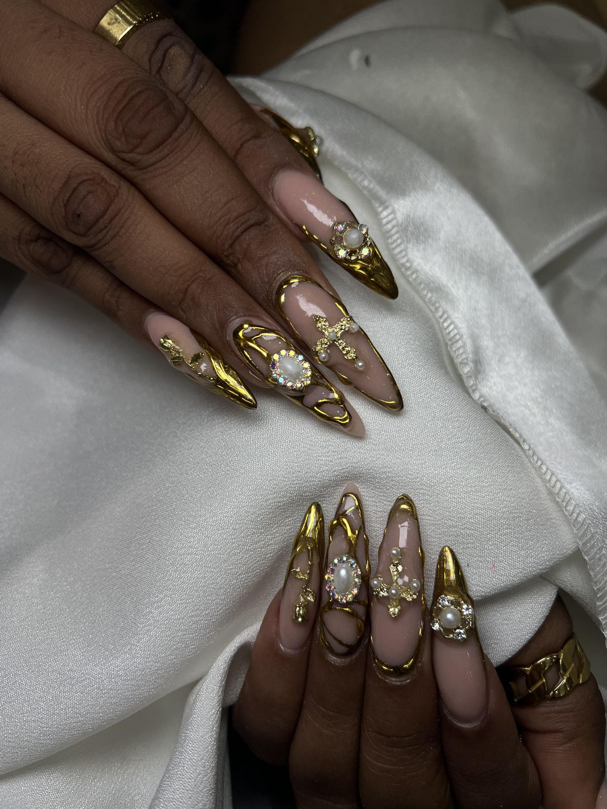 Ornate Gold Charms and Pearls on Nude Ornate Gold Charms and Pearls on Nude — Gold Birthday Nails 2027