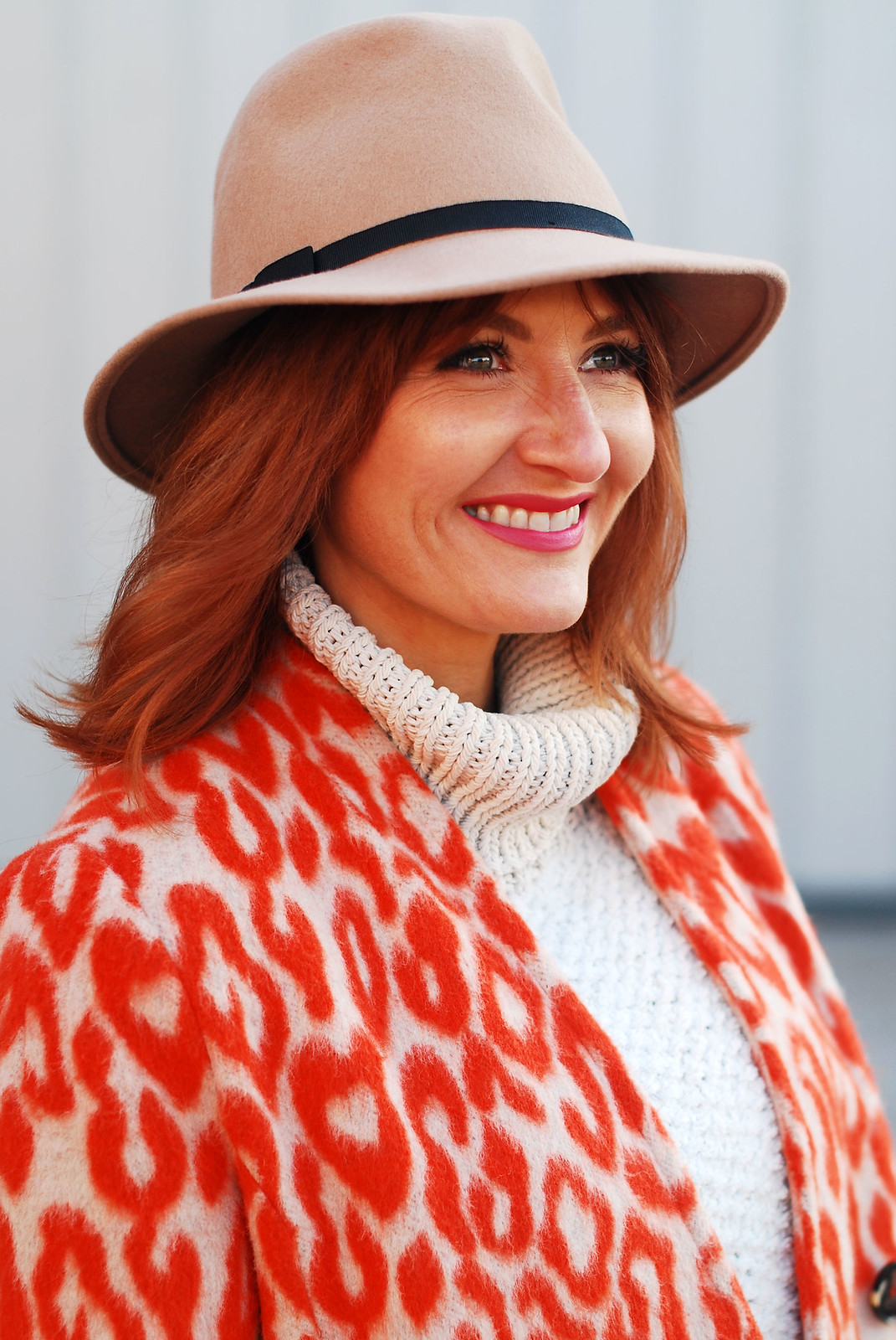 Orange and White Animal Print Coat Statement Orange and White Animal Print Coat Statement — Winter Colorful Outfits 2027