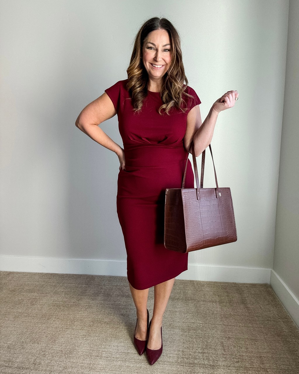 Monochromatic Burgundy Sheath Dress with Structured Tote Monochromatic Burgundy Sheath Dress with Structured Tote — Winter Office Outfits 2027